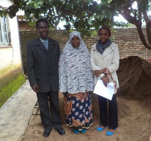 Kinglsey a microfinance consultant, Janet Yuda, and Jessie our microfinance coordinator