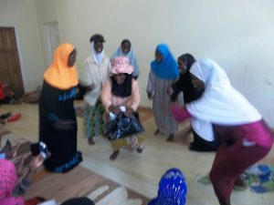Women from Mtendere perform a drama