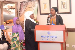 Three Muslim girls from MASYAP presenting at Protea Hotel Ryalls