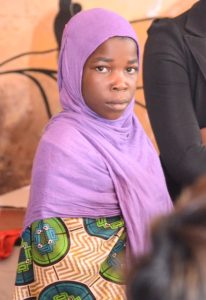 Muslim girl from MASYAP in purple headscarf