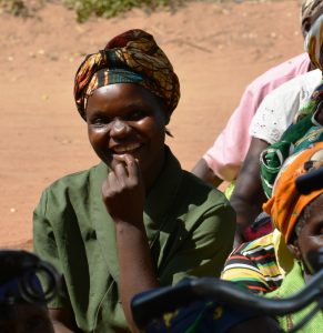 Woman answering question as part of HIV quiz, Balaka, Malawi