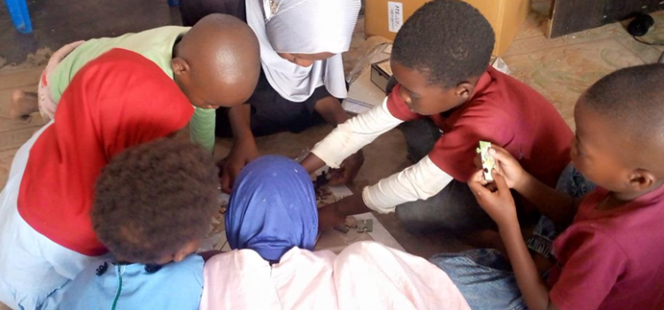 Muslim World League Donates Puzzle Solving Games for Children